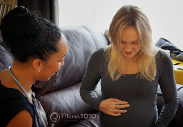 Pregnant woman asks midwife a question